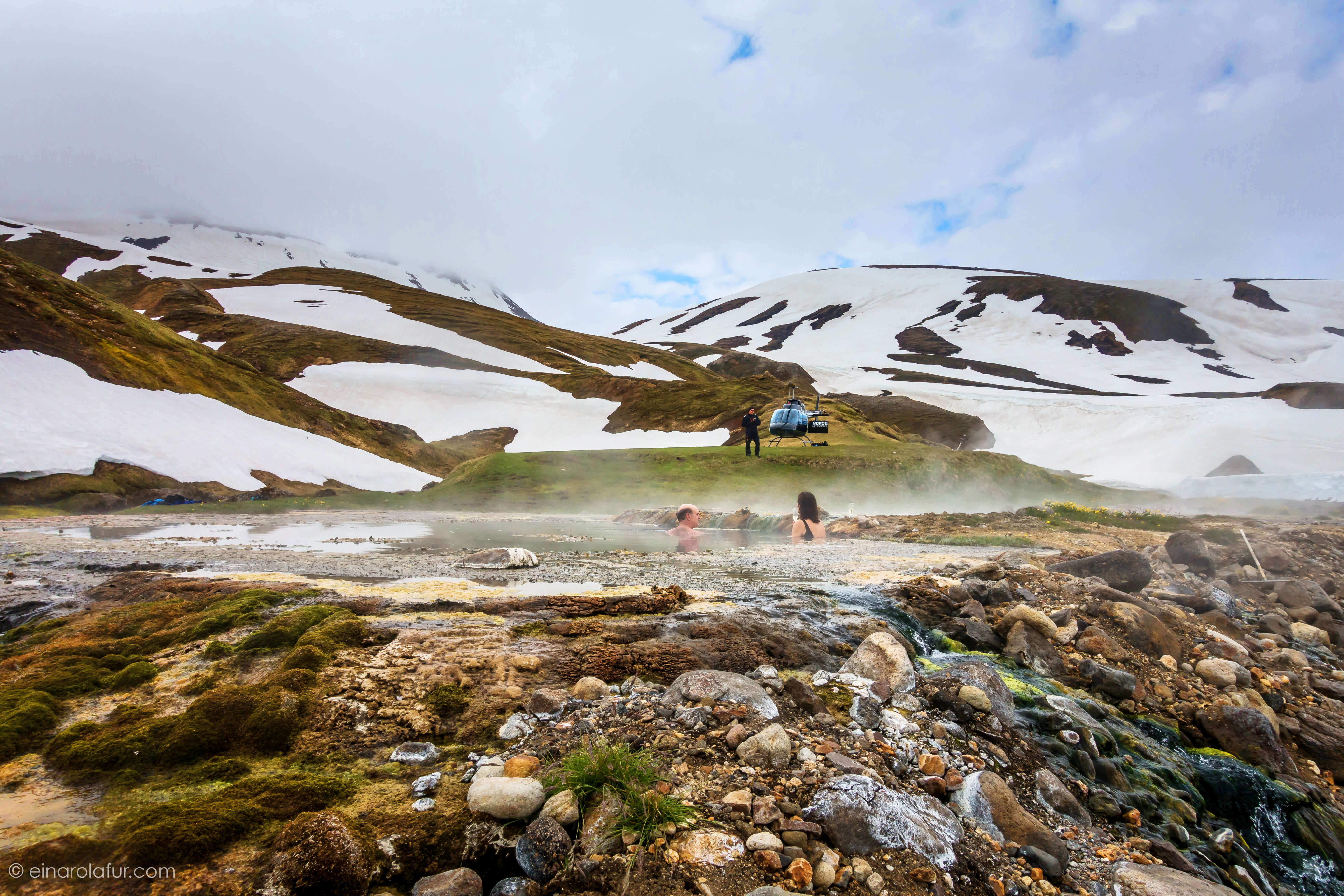 Visit a hot pool in the highlands by helicopter, pop open a bottle of Champagne and enjoy!